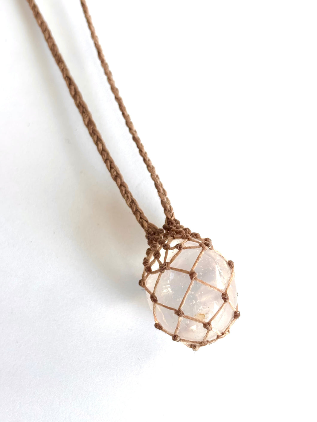 Rose Quartz netted in tan cord