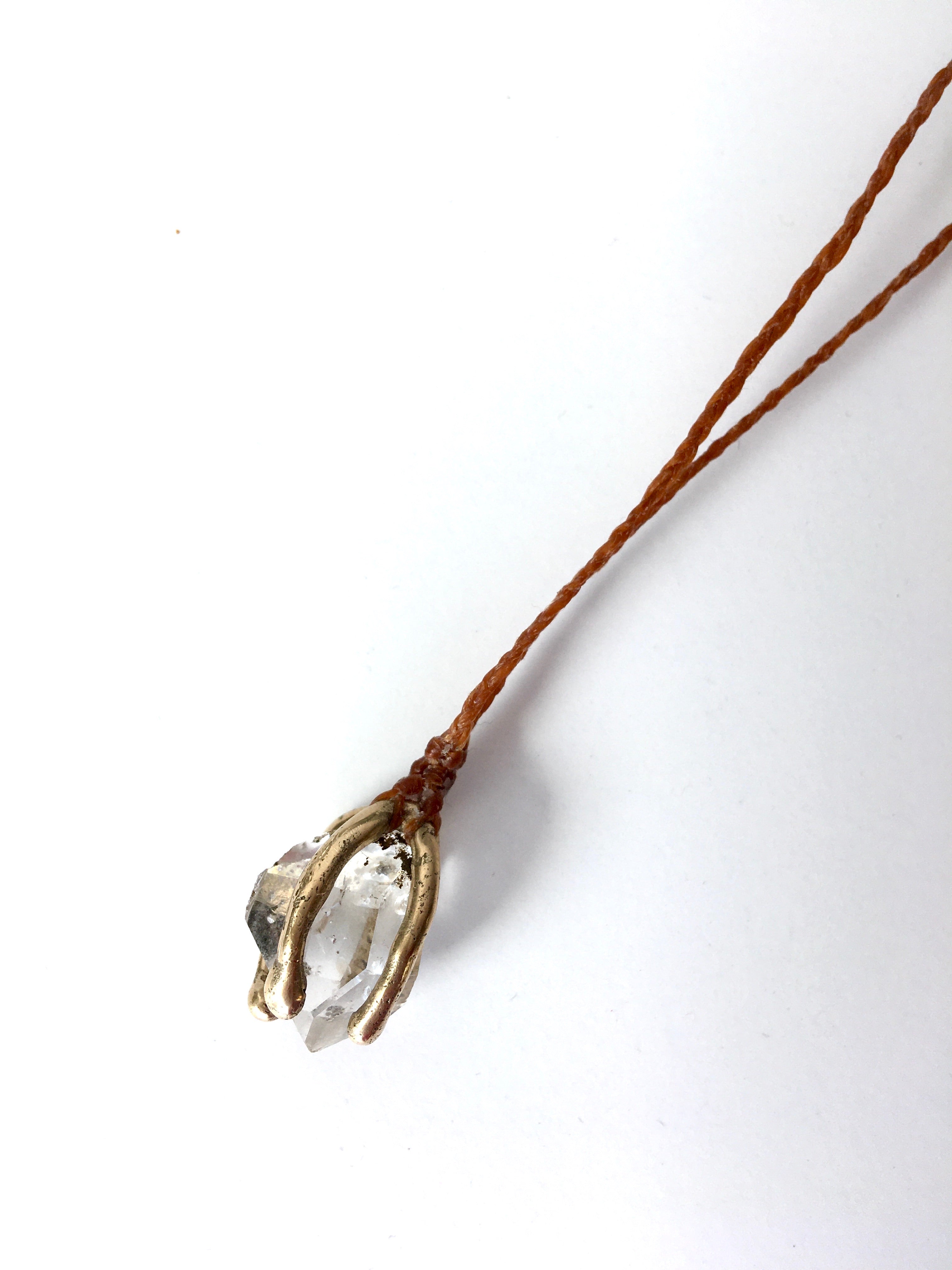 herkimer diamond caged in 14k gold